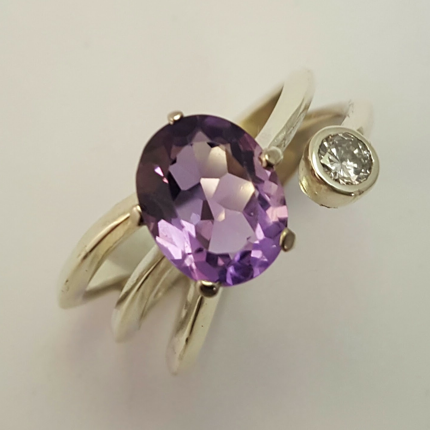 Design your own Engagement Ring : Package B: 9ct white gold ring featuring oval faceted amethyst and 4mm brilliaint cut diamond