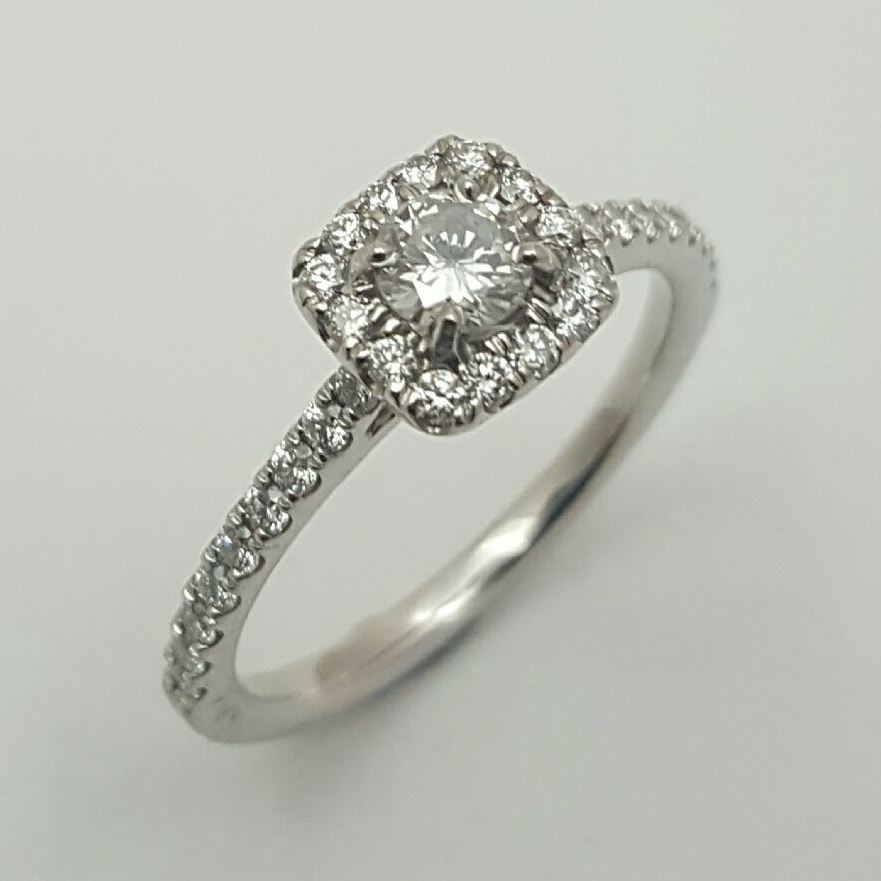 Marry Me Ring Package B: Platinum ring featuring a 4mm brilliant cut diamond with rainbow set diamond mele